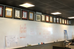 Caricatures in IT room, Colorado Spring office