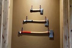 axes-on-wall, leather hangers from Germany