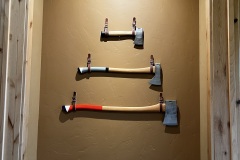 axes-on-wall, leather hangers from Germany. Denver CO area.