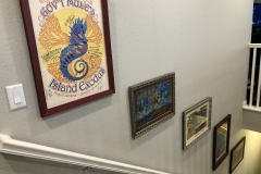 rock posters in stairway Commerce City